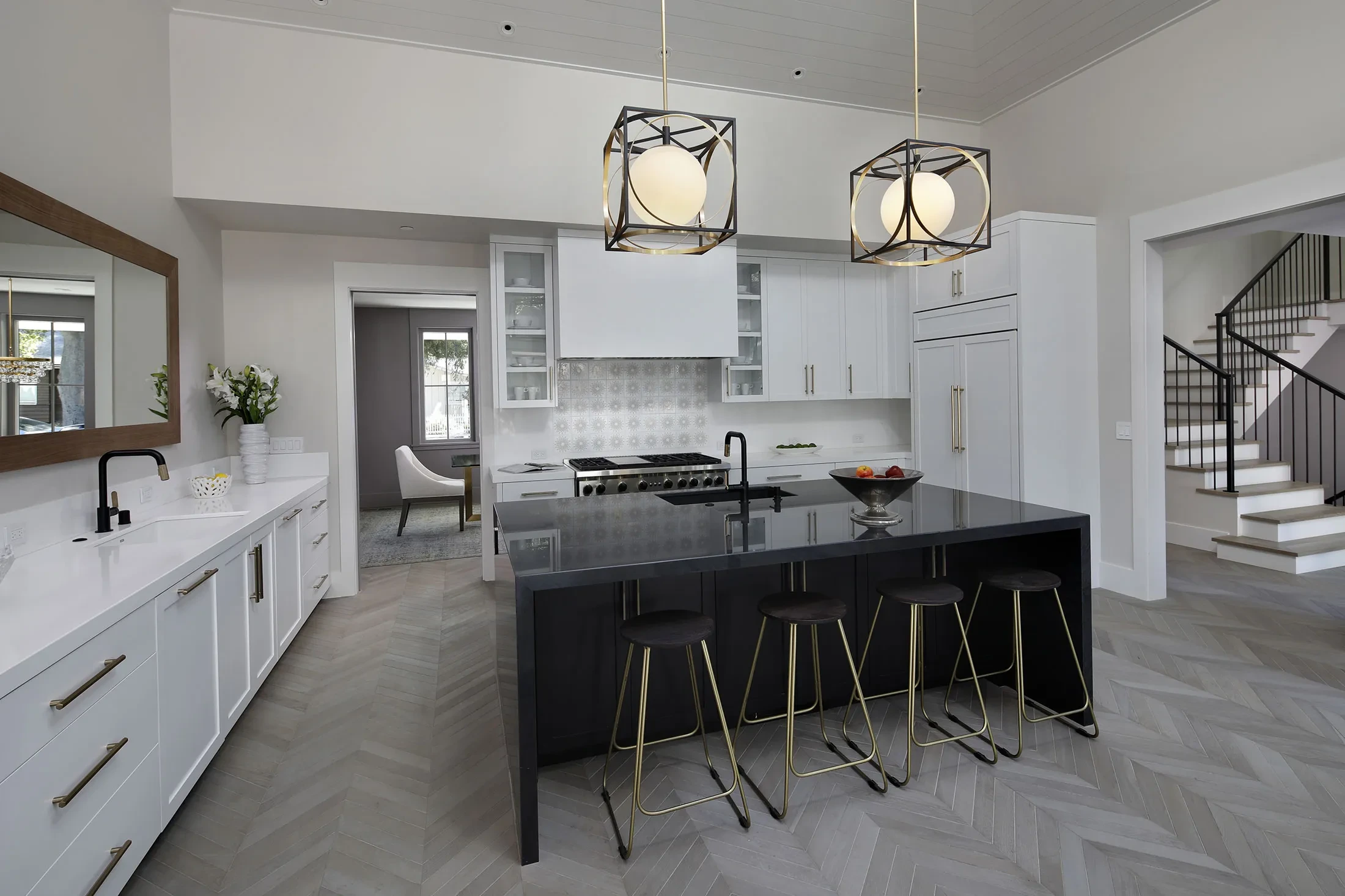 Byron by GHG Builders — kitchen with dark island and pendant lighting