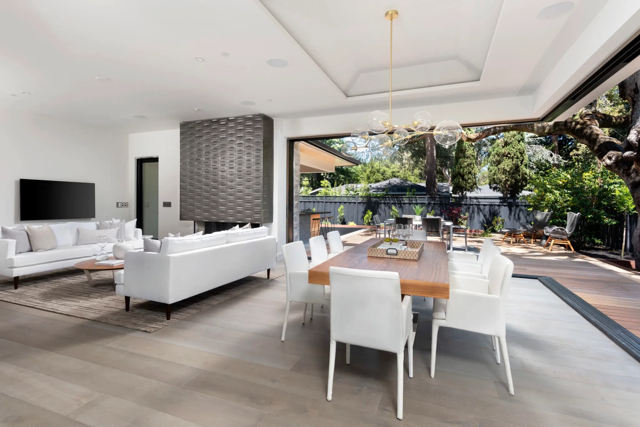 Pineview by GHG Builders — dining area opening to the pool terrace